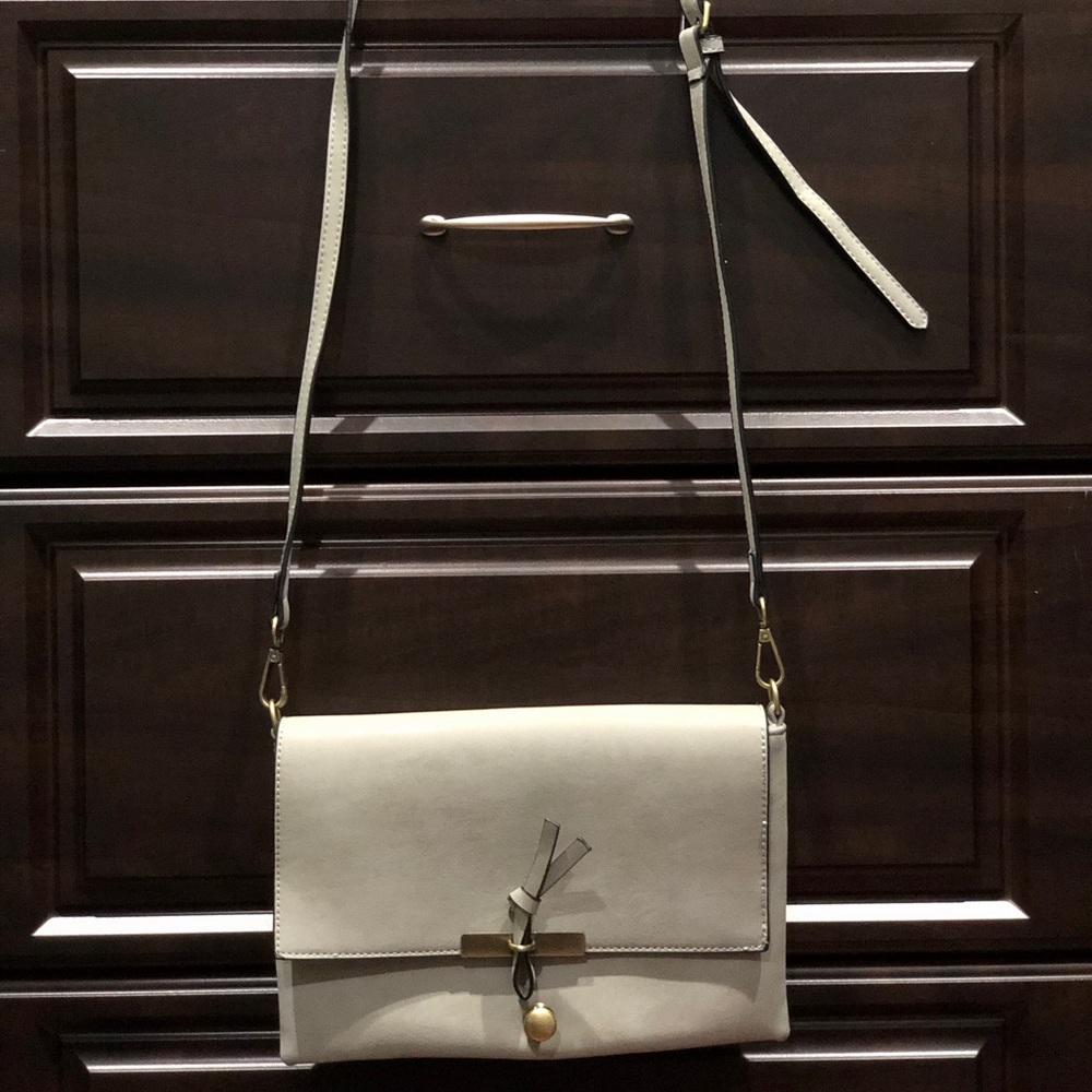 Francesca’s grey faux leather clutch/crossbody